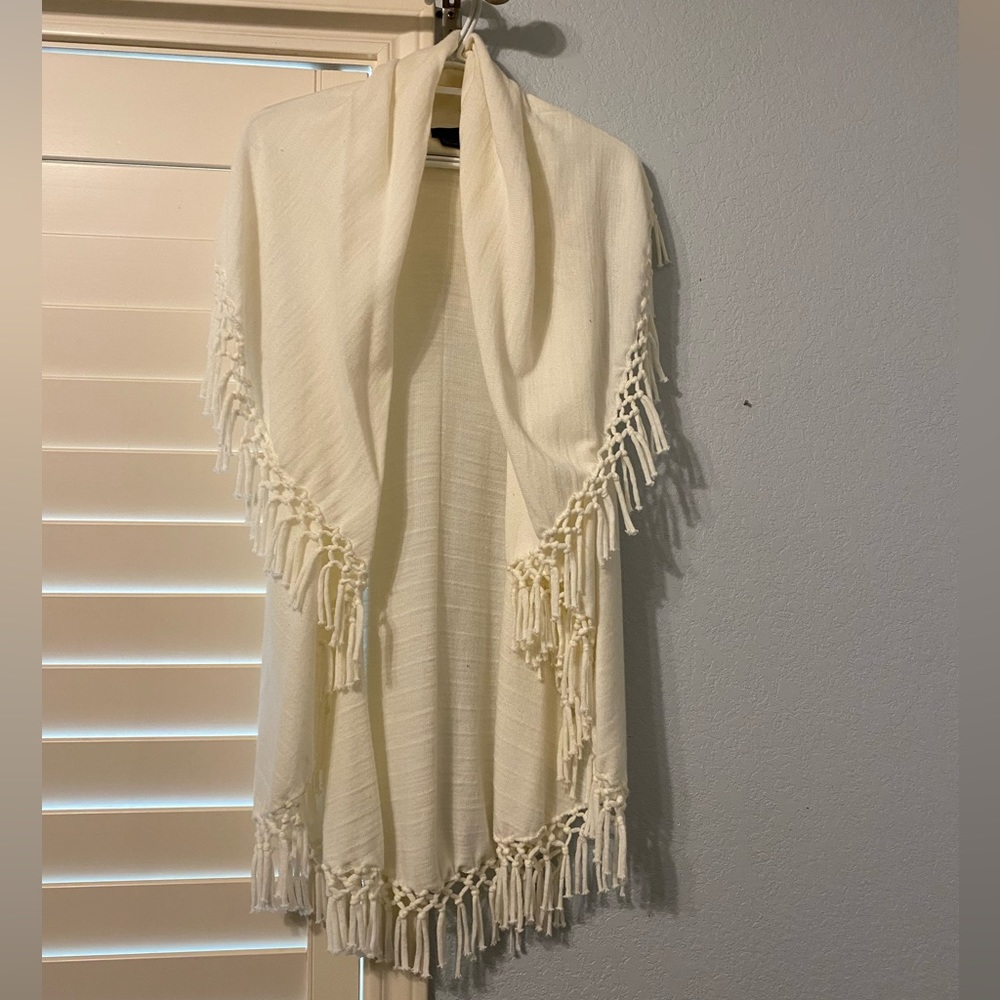 Cream sleeveless cardigan